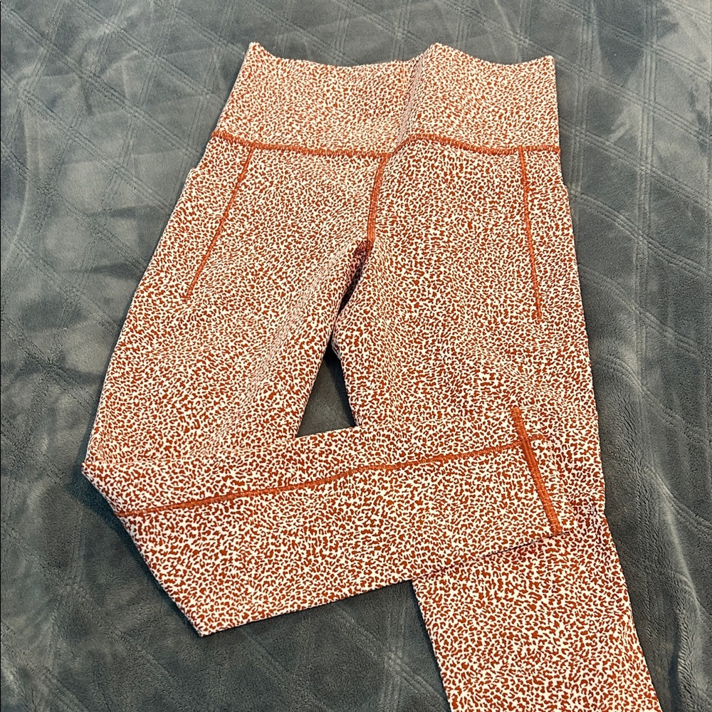 Athleta Rust Leopard Salutation Stash II High-Rise Leggings